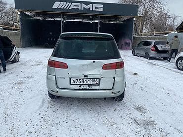 kia stinger: Mazda 2: 2003 г. — 2