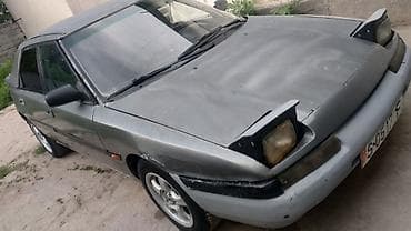 авто талас: Mazda 323: 1989 г., 1.6 л, Кол менен иштөөчү, Бензин, Хетчбек — 2