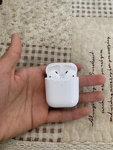 ipod mini: Беспроводные наушники Apple AirPods (зарядный кейс с индикатором — 1