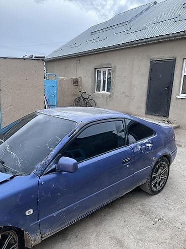 nissan 180sx: Купе синего цвета с тонированными стеклами и спортивными дисками — 5