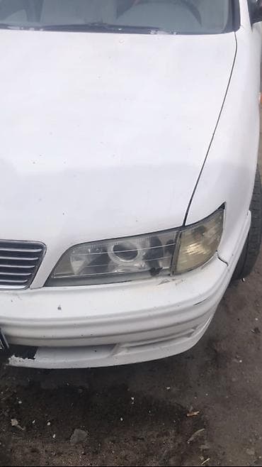 айнек авто: Алдыңкы сол фара Nissan — 1