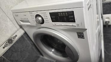 xbox slim: Стиральная машина LG с фронтальной загрузкой, технология Direct Drive — 1