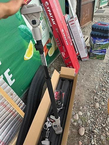 спилы: Аккумуляторный садовый набор УРАГАН 48V: штанговая пила + секатор — 5