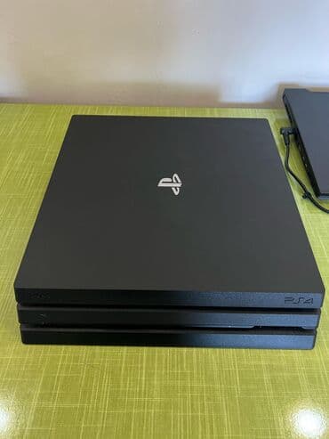 PS4 PRO 1TB 2 Контроллера (1 Оригинальный и реплика) В комплекте at lalafo.kg PS4 PRO 1TB 2 Контроллера (1 Оригинальный и реплика) В комплекте