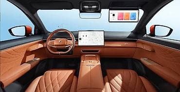 m 5: Электрический кроссовер (оранжевый металлик) с купеобразным силуэтом и — 2