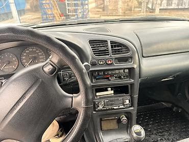 кузов жасайбыз: Mazda 323: 1996 г., 1.6 л, Механика, Бензин, Хетчбек — 4