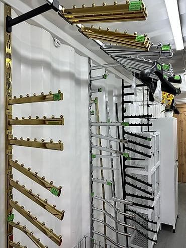 Торговое оборудование: Настенные профиля и кронштейны к ним. Профиля просты в установке,после — 2