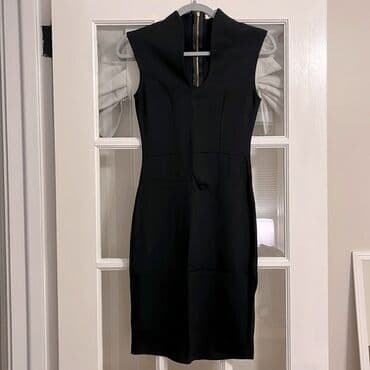 Классное платье от фирмы"ROLLA COSTER" размер 42-44. Новое с