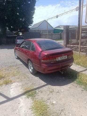 mini kuper: Mazda 626: 1992 г., 2 л, Механика, Бензин, Хэтчбэк — 3
