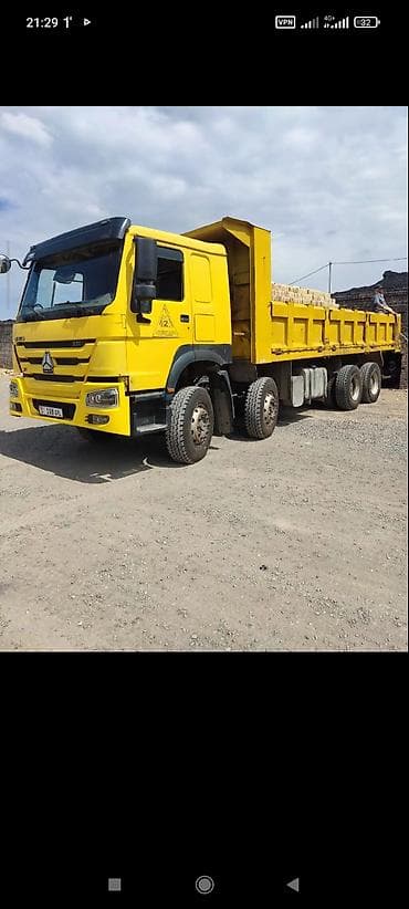 экскаватор w60: Самосвал Howo (CNHTC) 371, желтый. - Колесная формула 6x4. - Мощность — 9