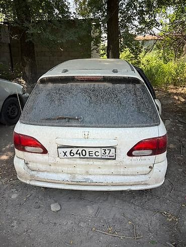 полик на минивэн: Honda Orthia (универсал), правый руль. Белый цвет кузова, 5 дверей — 1