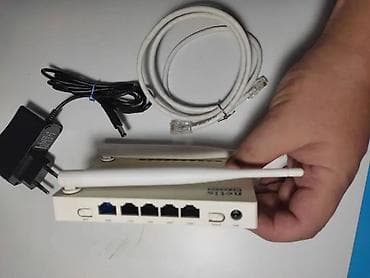 Модемы и сетевое оборудование: Wi-Fi роутер Netis WF2419E (N300, 1xFE WAN, 4xFE LAN, 2 антенны) — 2