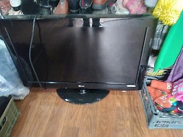 Телевизоры: Телевизор LG, диагональ примерно 32" (80 см). - Плоский ЖК-экран с — 1