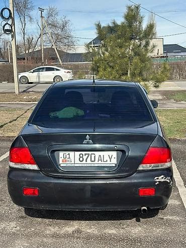 honda capa: Mitsubishi Lancer: 2006 г., 1.6 л, Механика, Бензин, Седан — 8