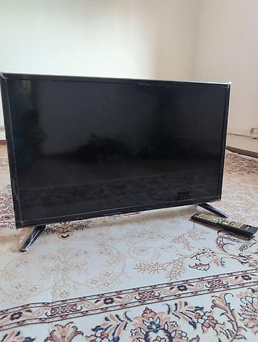 LED телевизор с плоским экраном, диагональ около 32–40". Черная рамка at lalafo.kg LED телевизор с плоским экраном, диагональ около 32–40". Черная рамка