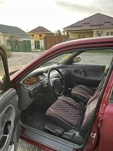 Транспорт: Mazda 626: 1992 г., 2 л, Механика, Бензин, Седан — 7