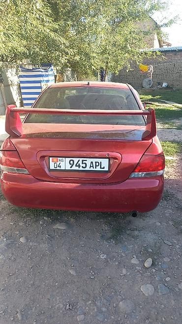 Транспорт: Mitsubishi Lancer: 2003 г., Седан — 3