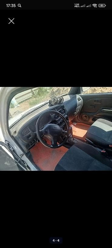 продажа ситроен: Daihatsu Cuore: 2002 г., 1 л, Автомат, Бензин, Хэтчбэк — 5
