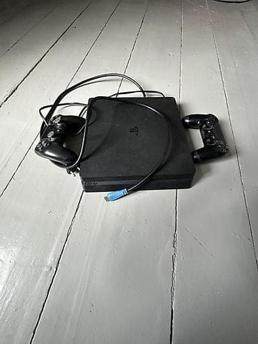 Игровая консоль Sony PlayStation 4 Slim (чёрная) ОБМЕН БАР at lalafo.kg Игровая консоль Sony PlayStation 4 Slim (чёрная) ОБМЕН БАР
