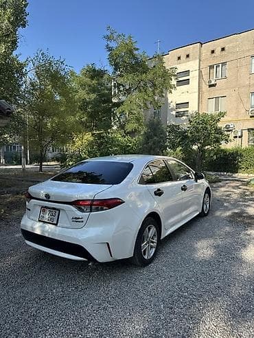 corolla 2004: Toyota Corolla: 2022 г., Гибрид, Седан — 4
