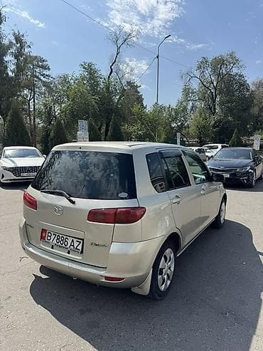 Транспорт: Mazda Demio: 2003 г., 1.3 л, Автомат, Бензин, Хэтчбэк — 4