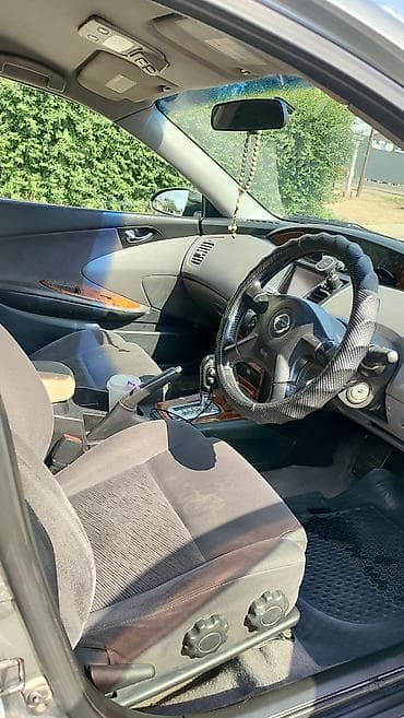 Nissan Primera: 2002 г., Седан — 5