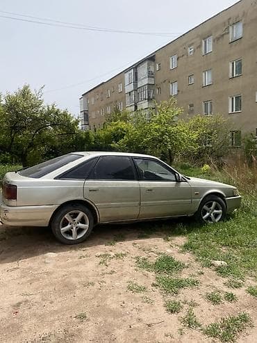 Транспорт: Mazda 626: 1991 г., 2 л, Механика, Бензин, Лифтбек — 2