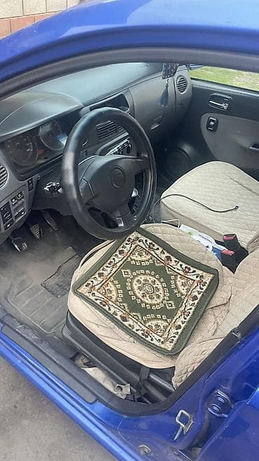 1956515 бу: Daihatsu Cuore: 2003 г., 0.1 л, Ручные, Бензин, Хэтчбэк — 5