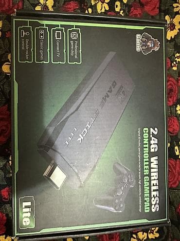 игры на сони 2: Игровая приставка Game Stick Lite 4K с двумя беспроводными геймпадами — 1