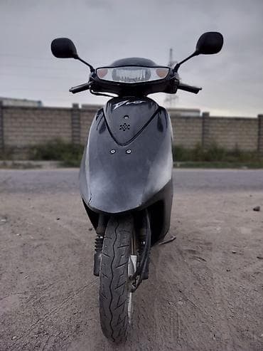 Мототехника: Honda Dio — городской скутер в чёрном цвете. Основные характеристики — 1