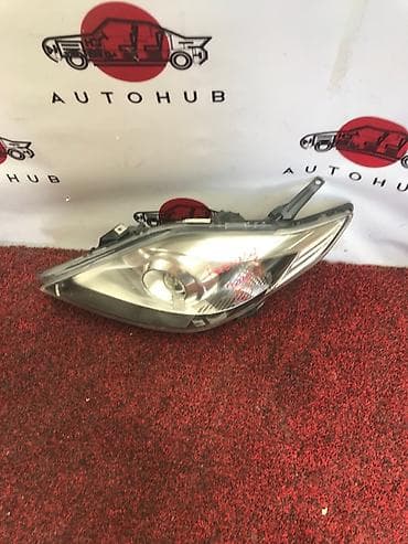 Системы освещения: Фара Mazda Premacy 2009 (б/у) — 1