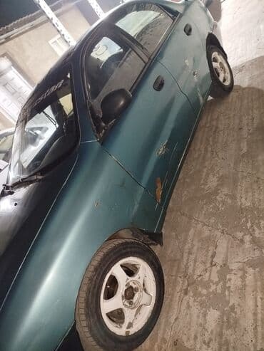 шинный центр с. ново николаевка фото: Daewoo Lanos: 1996 г., 1.5 л, Механика, Бензиновая, Седан — 5