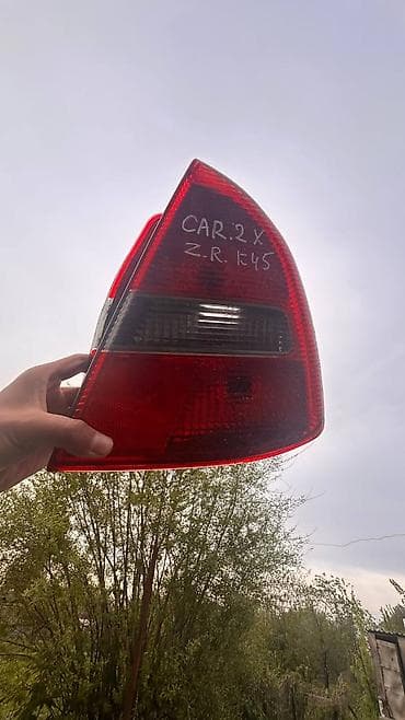 бампер на авансиер: Задние стопы Митсубиси Каризма — 1