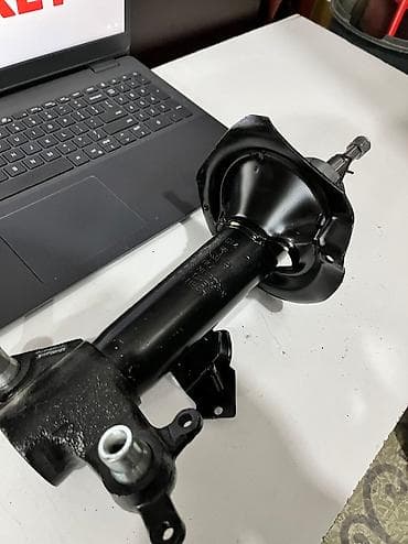 primera: Передний амортизатор Nissan 2007 г., Новый — 3