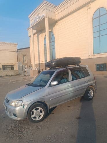 домкрат гидравлический для вытяжки авто: Mazda Demio: 2001 г., 1.3 л, Автомат, Бензин — 2