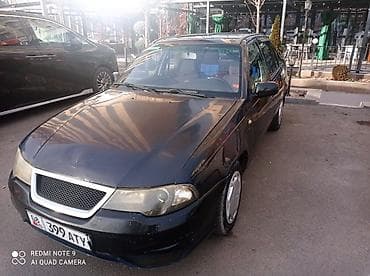 ford focus 2002: Седан темно-синего цвета на киргизских номерах (KG, номер 399 ATY) — 3