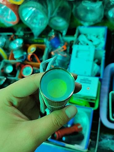 рии: Компактный светодиодный фонарик с ремешком на запястье. Особенности — 2