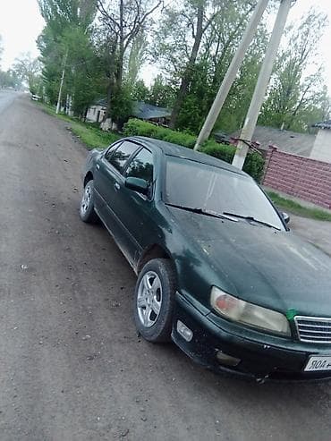 выкуп авто мазда: Седан темно-зеленого цвета, правый руль. Кузов 4-дверный, просторный — 2