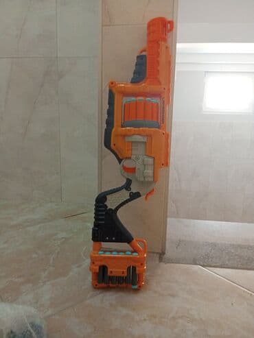 пистолет стреляет орбизами: Бластер NERF Doomlands Lawbringer - Механический револьверный бластер — 6