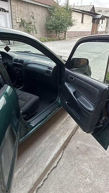объем 2 0: Mazda 626: 1998 г., 1.8 л, Механика — 2