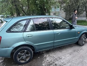 15 демио: Mazda 323: 2002 г., 1.6 л, Механика, Бензин, Хэтчбэк — 2