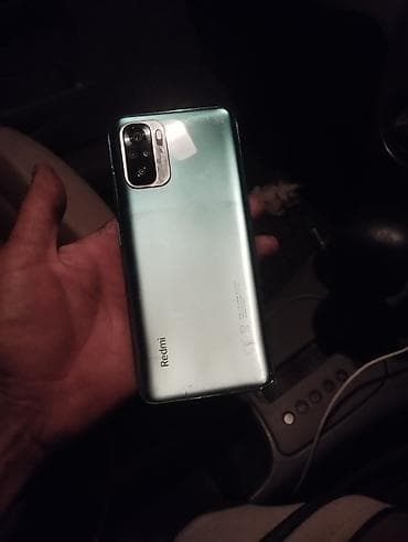 mi camera: Смартфон Redmi (серия Note, корпус мятно‑зеленого цвета). Ключевые — 1