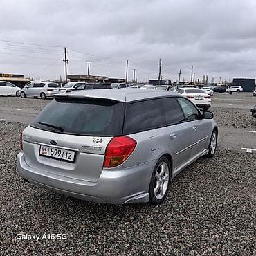 сабару легаси: Subaru Legacy (правый руль), серебристый седан/универсал — интерьер и — 7