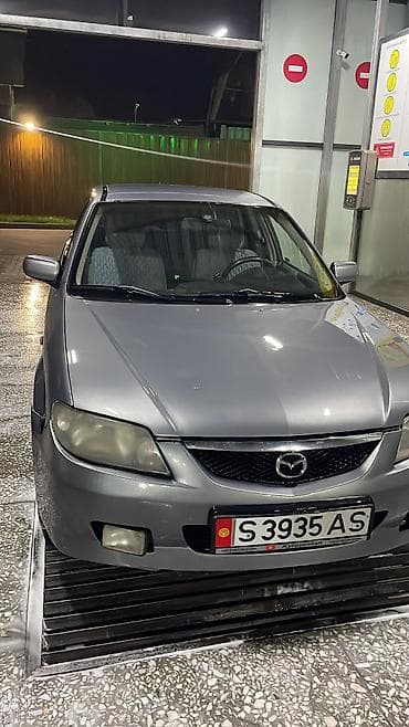 Mazda 323: 2003 г., 1.6 л, Механика, Бензин, Хэтчбэк