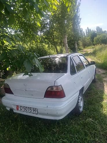 авто телега: Daewoo Nexia: 1996 г., Механика, Седан — 4