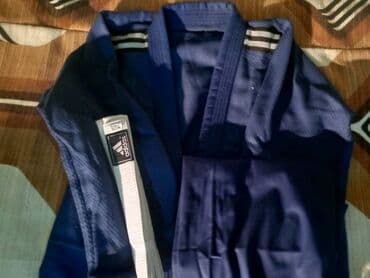 Кимоно синего цвета,размер 4/170 см.Цена 2500 с