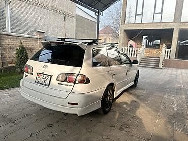 подлокотники: Toyota Caldina: 2002 г., 2 л, Автомат, Бензин, Универсал — 8