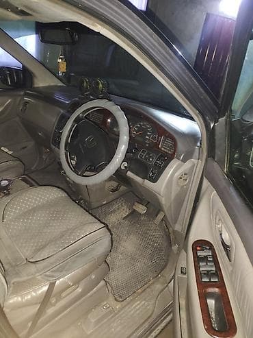 Honda Odyssey: 1999 г., 3.5 л, Автомат, Газ, Минивэн — 10