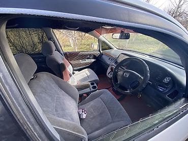 дома на колесах: Honda Odyssey: 2000 г., 2.3 л, Автомат, Газ, Универсал — 5