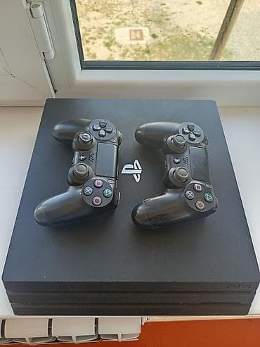 xbox seroes s: PlayStation 4 Pro (PS4 Pro) с двумя беспроводными геймпадами DualShock — 1